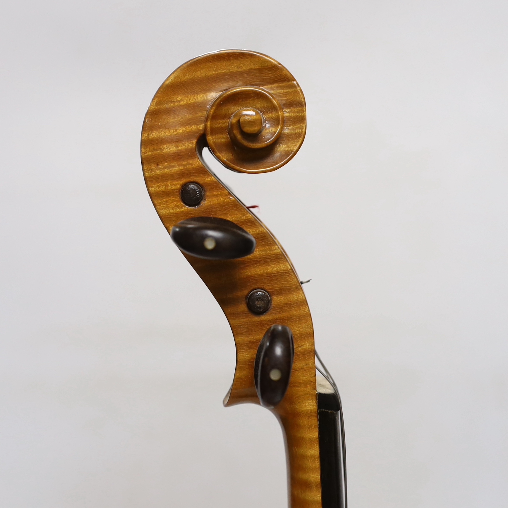 A bird's eye maple veneered student's violin, 58.5cm long